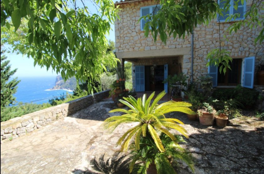 Sea view stone house with traditional features for sale in Deia