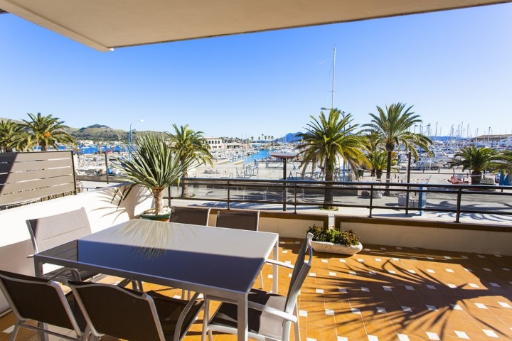 First line apartment with views to the beach and marina for sale in Port of Pollensa