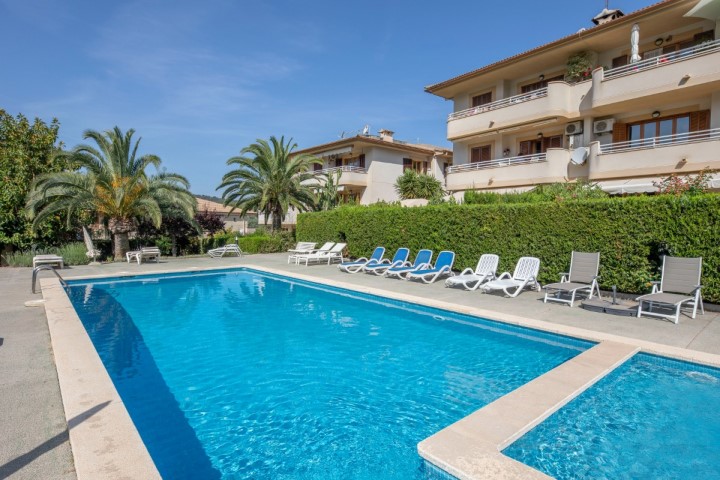 Large bright apartment with parking space and community pool for sale in Port de Sóller